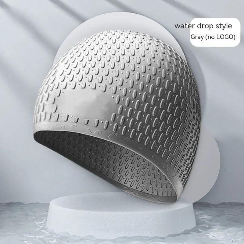 Adult silicone swimming cap with water drop design in various solid colours