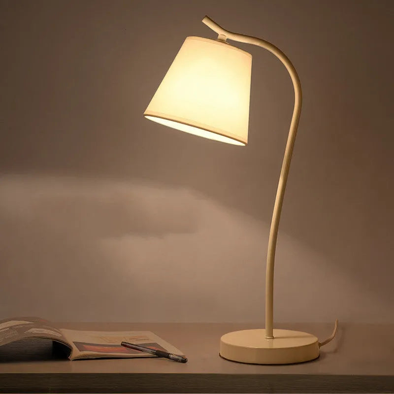 Nordic style desk lamp with dimmer switch in white finish on wooden desk