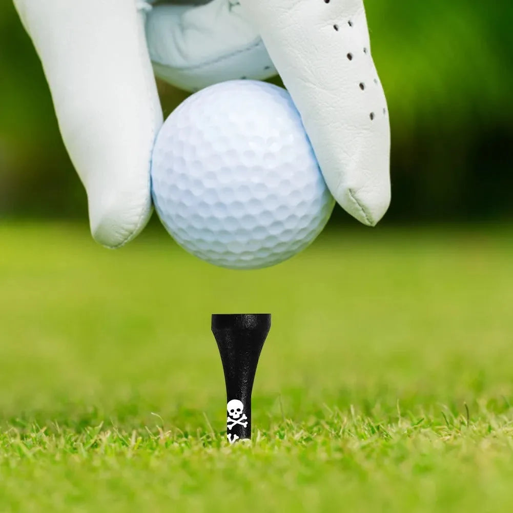 Pack of ten black bamboo golf spike dowel pins with skull print, showing 70mm and 83mm length options