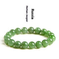 Natural jasper bead bracelet on wrist showing polished Hetian jade construction with multiple bead size options