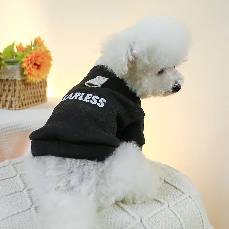 Pet clothing traction sweater in black with open button design for dogs and cats on neutral background