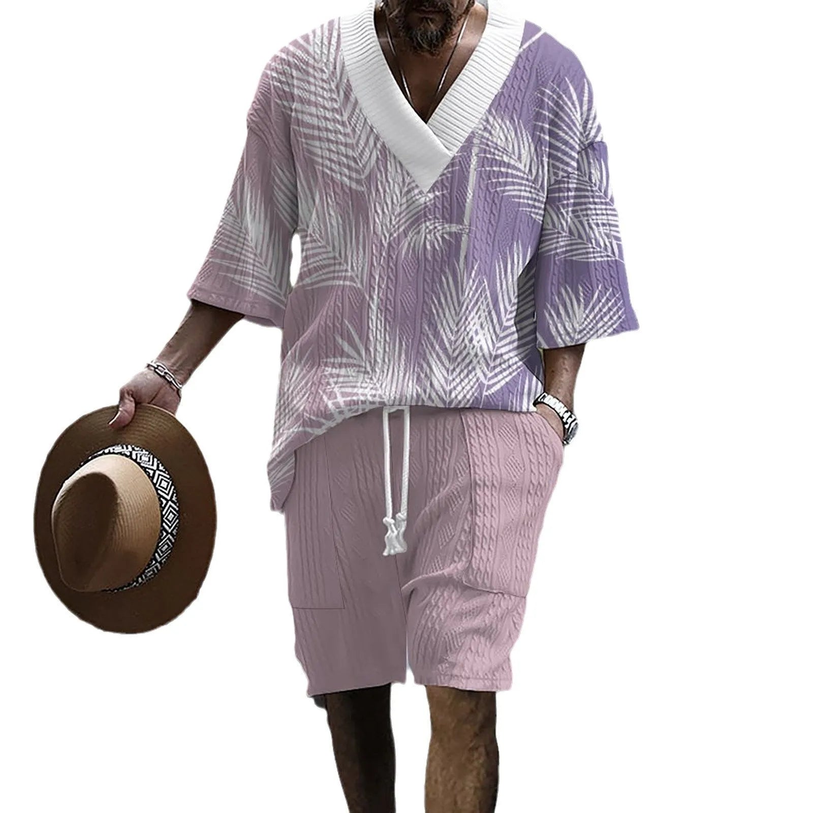 Printed men's knitted drop-shoulder short-sleeved top and matching shorts set in a polyester blend.