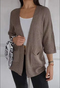 Women's thin waffle weave cardigan coat in army green with nine-quarter sleeves and pockets.