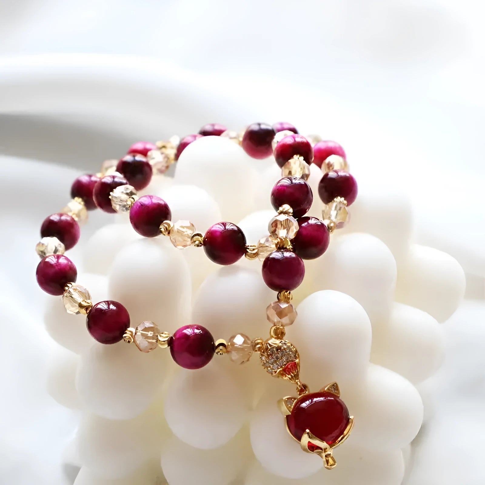 Handmade natural Tigereye stone bracelet with Vanves stone centre, shown in single and double chain designs.