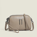 Women's genuine leather square shoulder bag in dark khaki colour, showing structured horizontal shape.