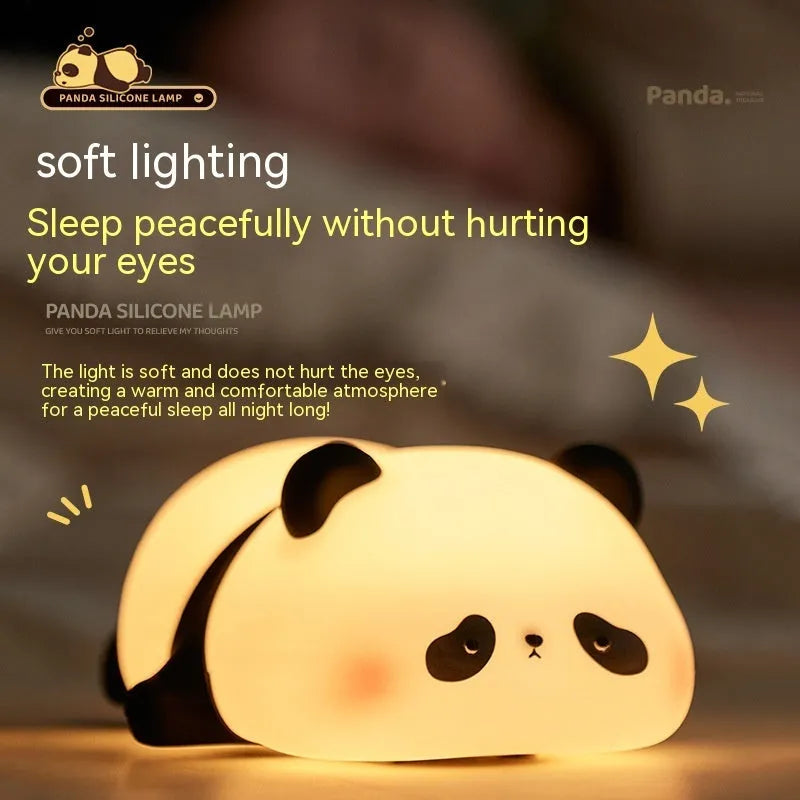 Cartoon panda head rechargeable night light with warm white glow on bedside table