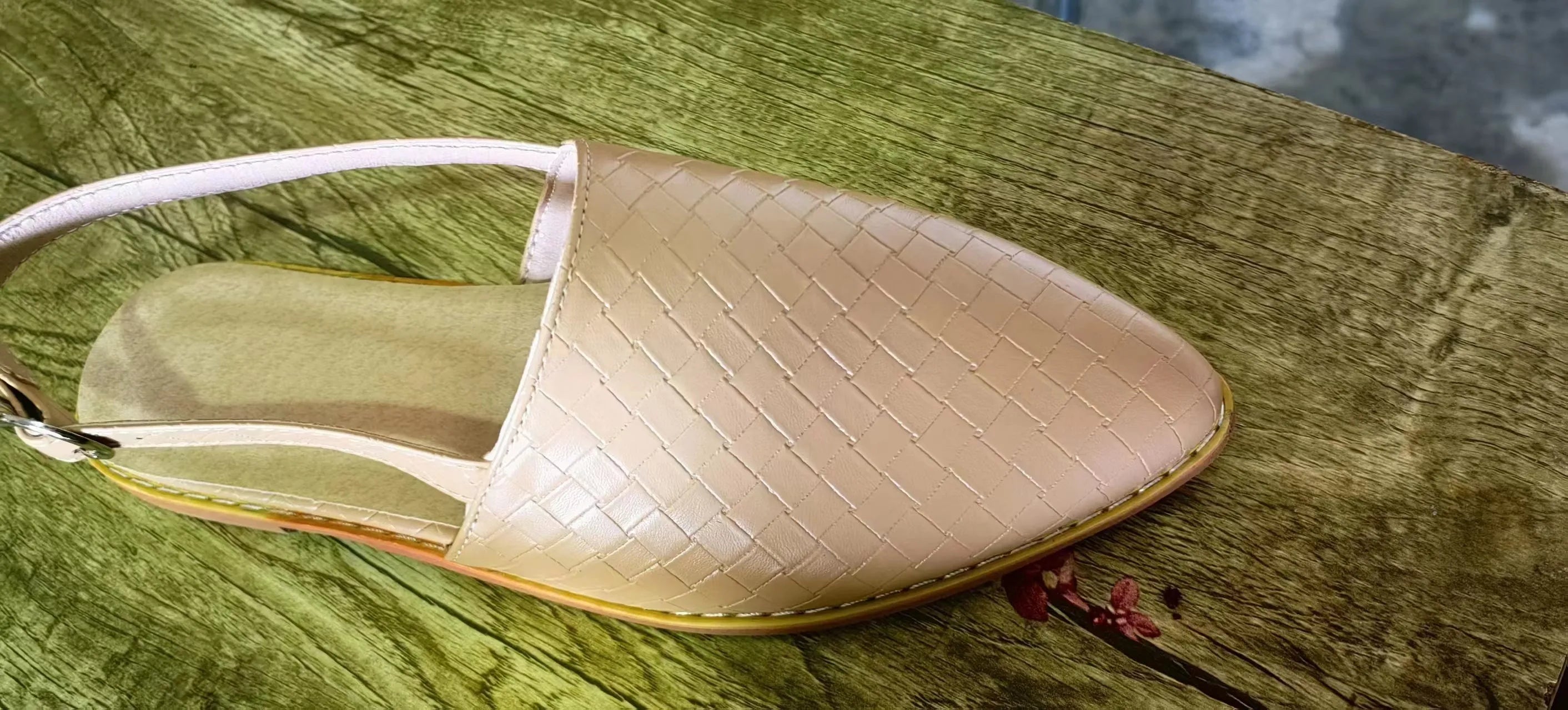 Women's flat buckle sandals with pointed toe in multiple colour options on a white background