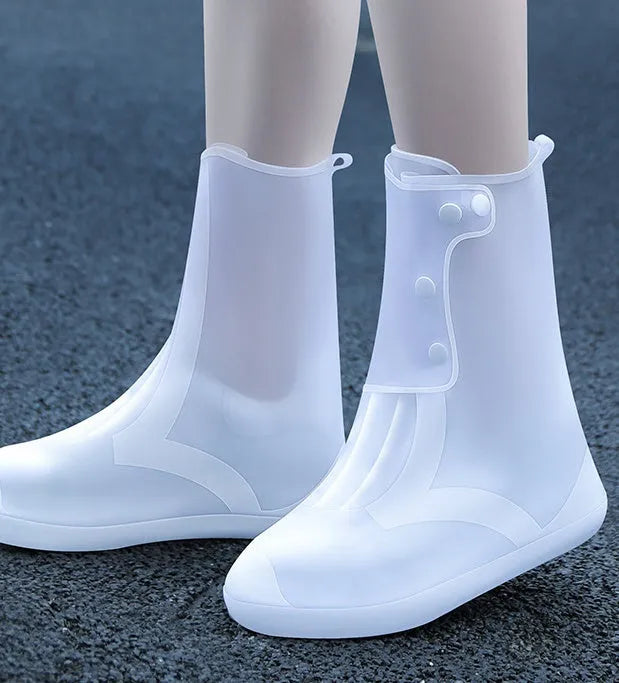 White high-top PVC reusable shoe covers for women, water resistant and anti-skid.