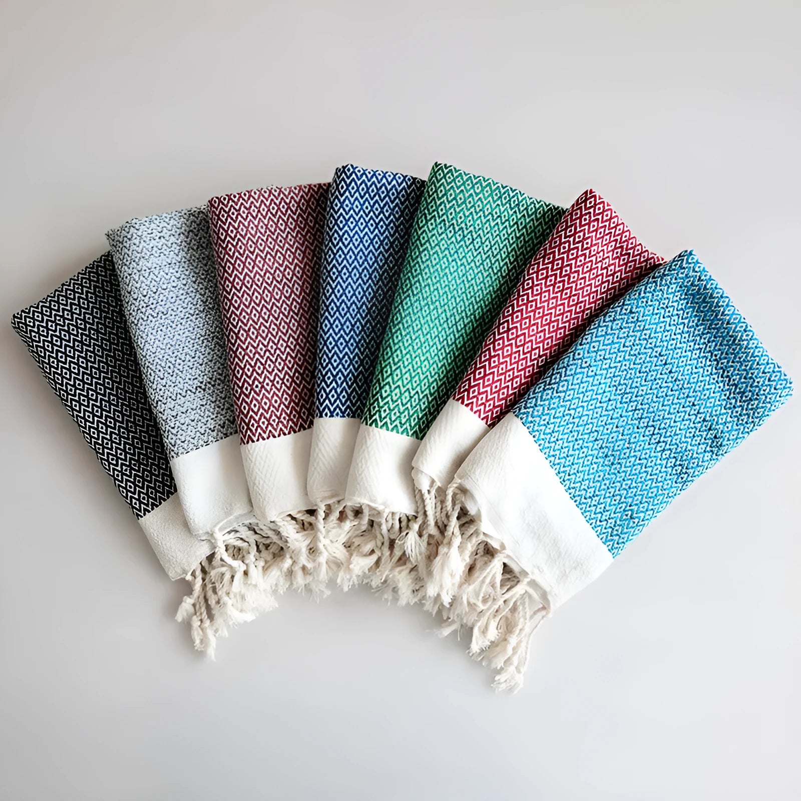 Square cotton yarn-dyed napkin with tassel edges in Nordic style, available in multiple colours