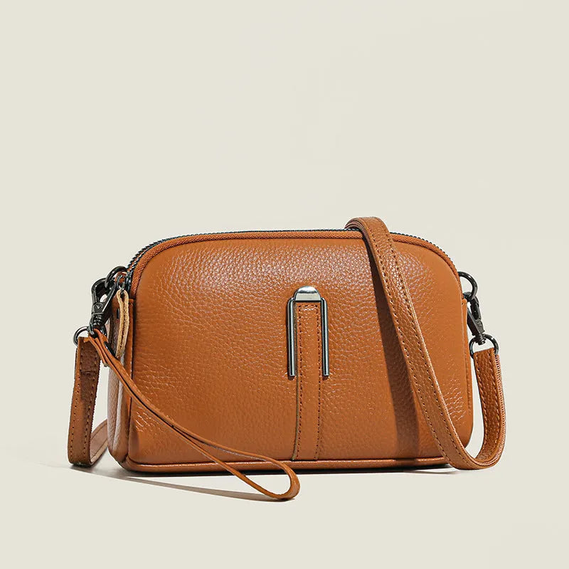 Women's genuine leather square shoulder bag in dark khaki colour, showing structured horizontal shape.
