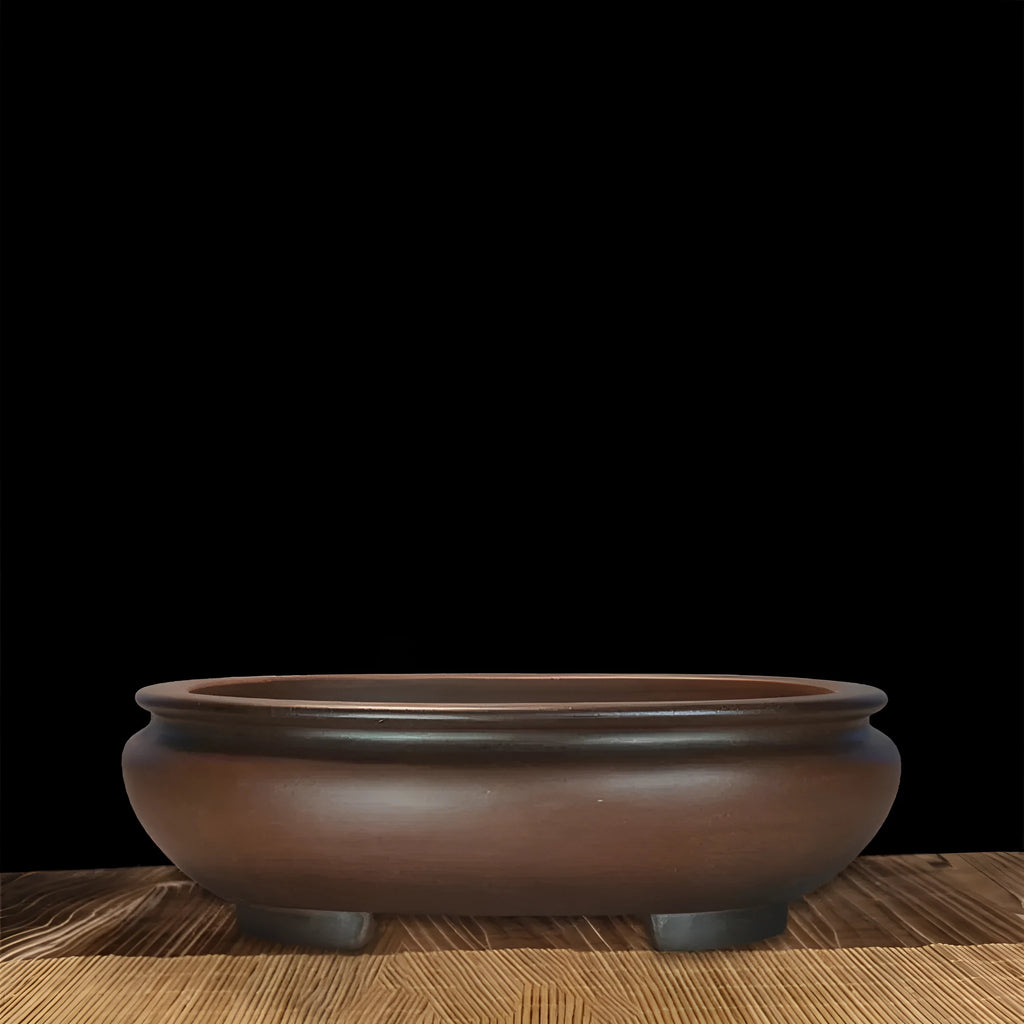 Purple clay handmade classical desktop flowerpot measuring 58 cm long by 47 cm wide.