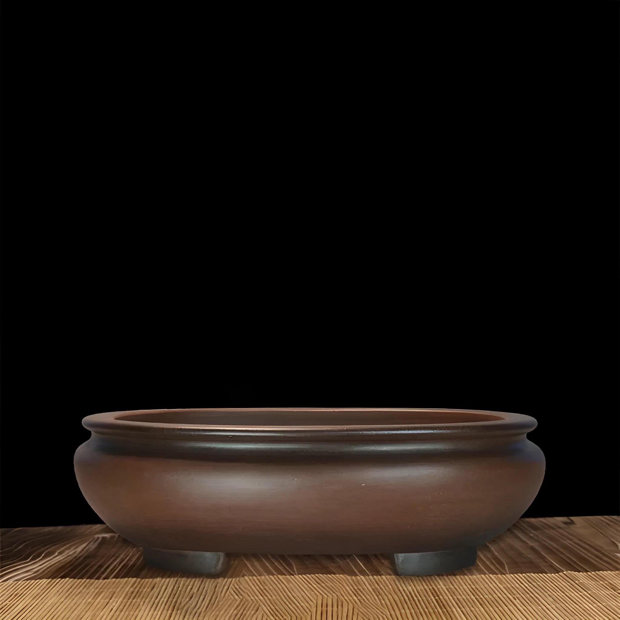 Purple clay handmade classical desktop flowerpot measuring 58 cm long by 47 cm wide.
