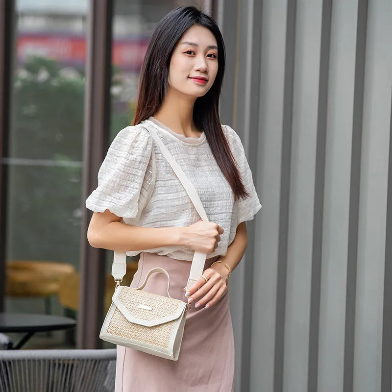 Simple woven sequin decorative crossbody small square straw bag in black with flap closure