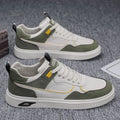 Men's low-top canvas board shoes in beige with leather stitching detail
