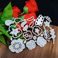 Silver carbon steel craft die with etched flower design for paper cutting, measuring 14.3 by 9.9 cm.