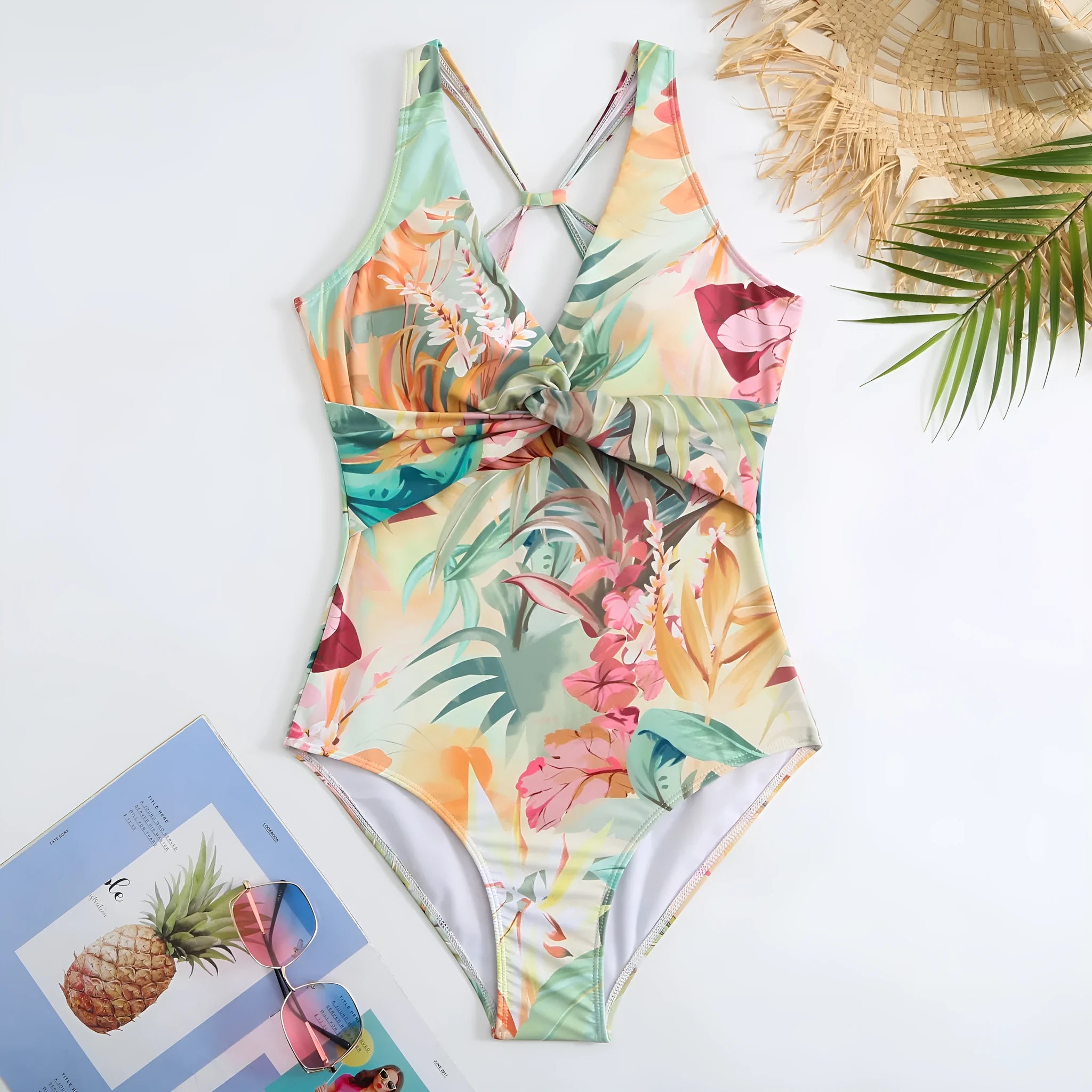 Women's yellow floral vintage print one-piece swimsuit with short sleeves on a mannequin.