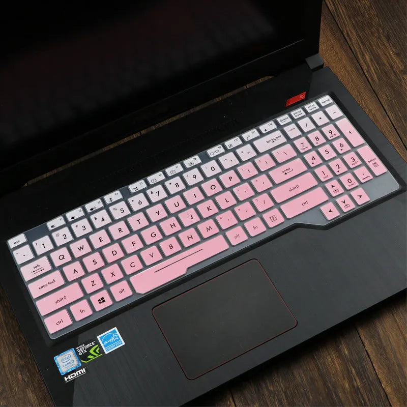 Clear protective keyboard film cover for ASUS Flight 14-inch laptop on a keyboard.
