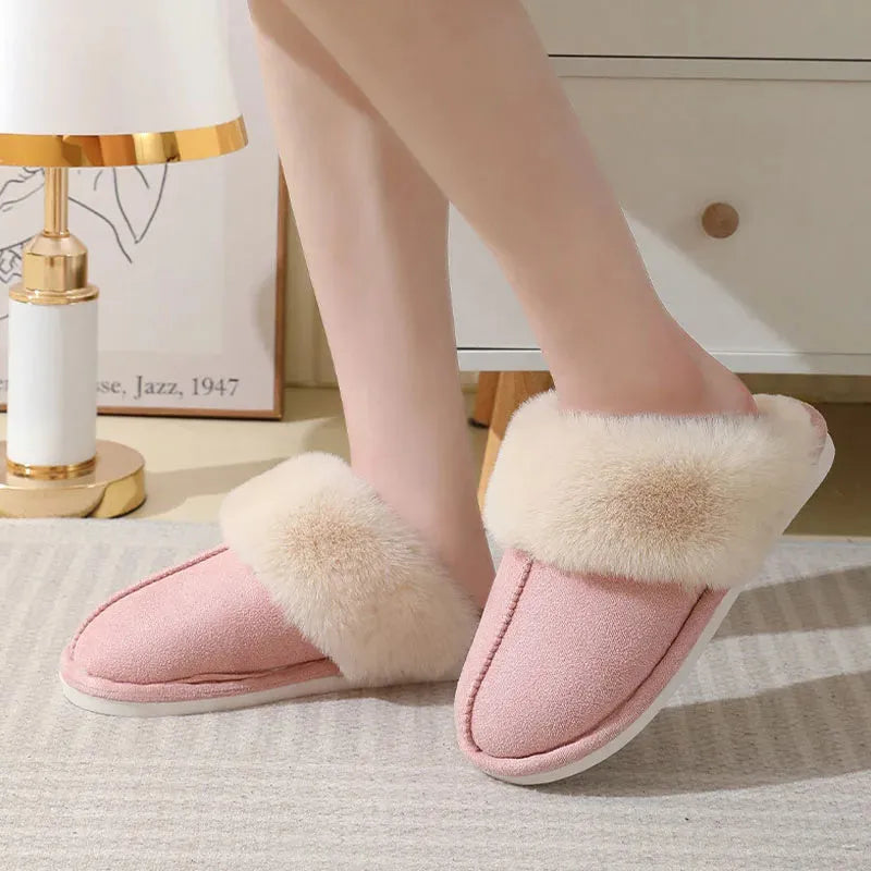 Women's brown plush indoor slippers with artificial wool lining and a textured PVC sole.