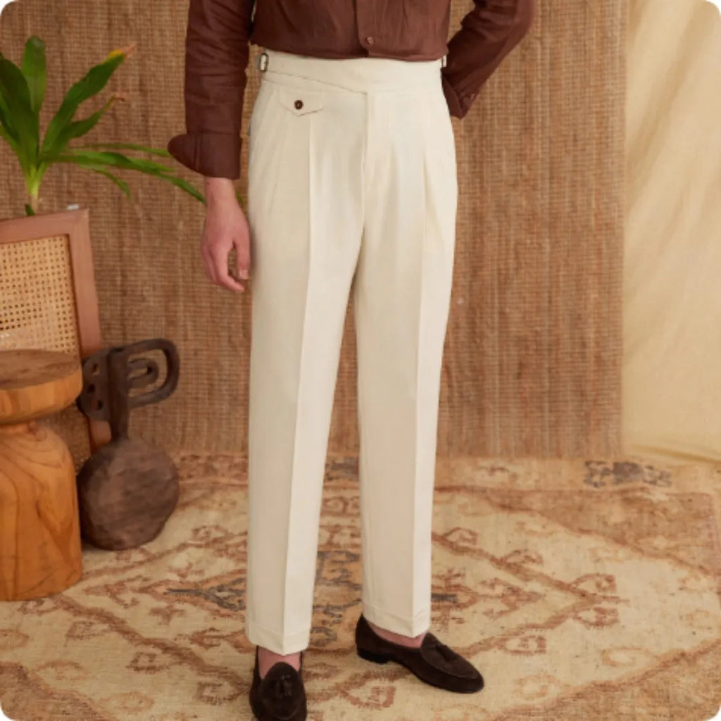 Men's slim fit straight leg business trousers in light brown colour, showing wrinkle resistant polyester fabric.