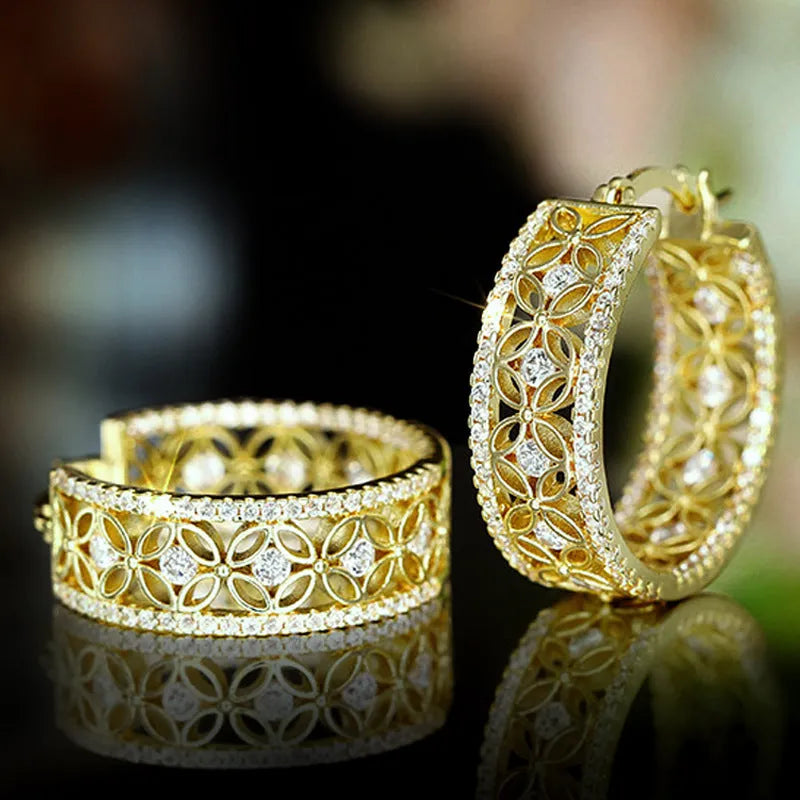 Yellow gold geometric horse eye ear clips with floral butterfly design for women