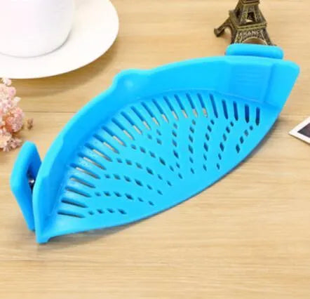Silicone clip-on kitchen funnel strainer for draining liquids from pots with buckle attachment