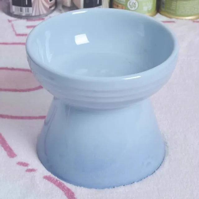 Black ceramic pet bowl with high foot and raised neck for dog or cat feeding