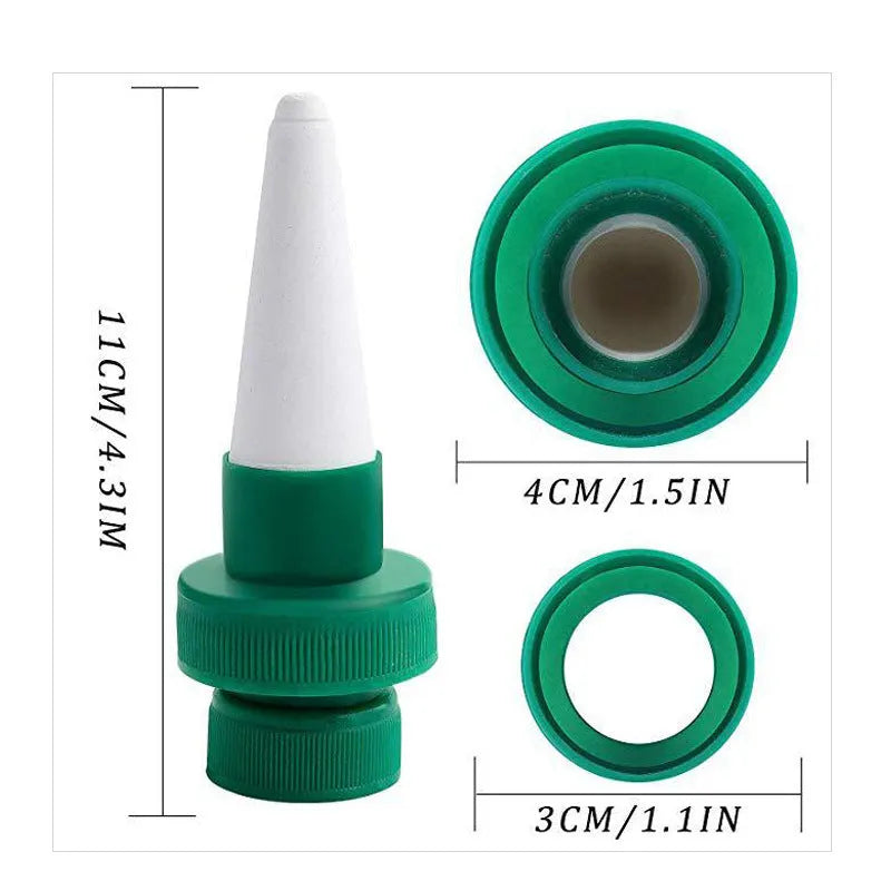 Green ceramic automatic plant dripper attached to cola bottle for watering indoor plants