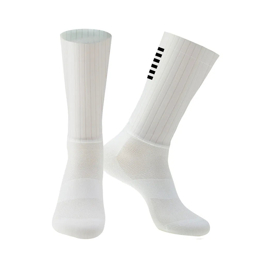 Pair of breathable chemical fibre blend athletic socks for cycling and running, shown in orange colour.