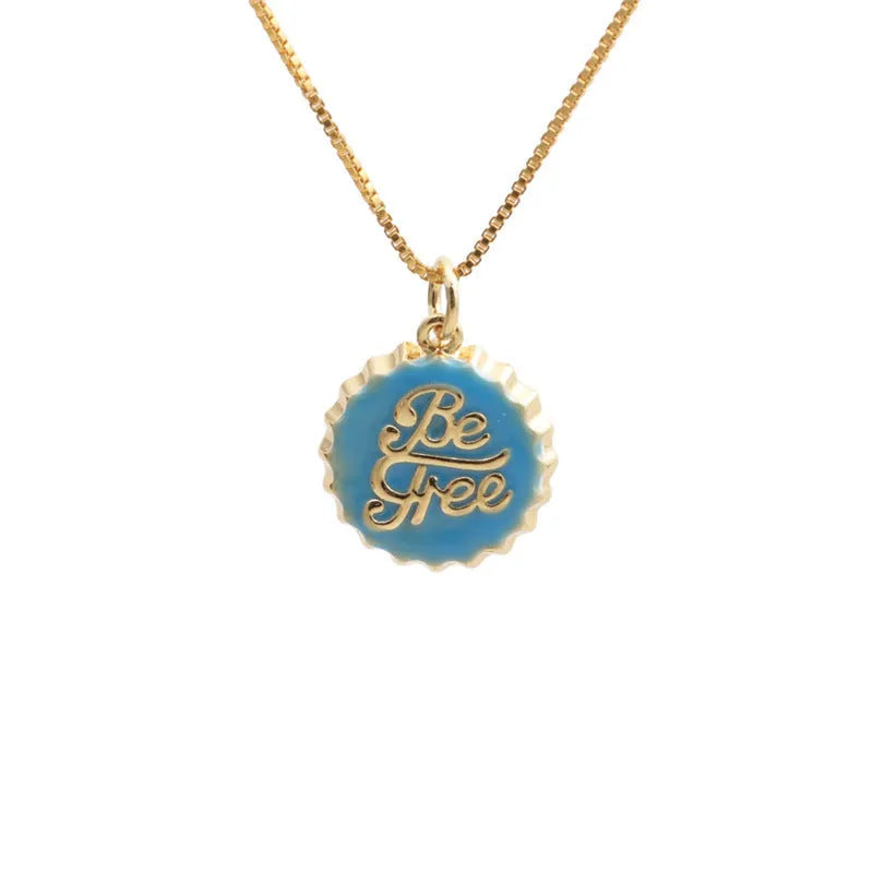 Copper bottle cap pendant necklace with gold plating on a 40cm box chain.