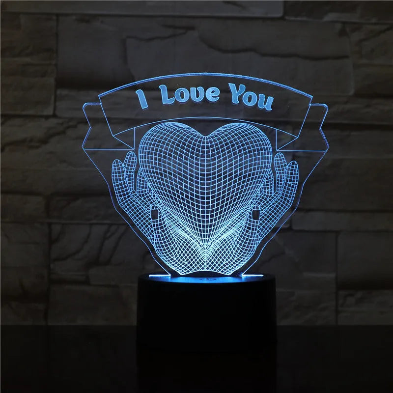 Valentine 3D night light with hands holding heart design in seven colour changing LED modes