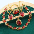 Full rhinestone zircon women's jewellery set showing necklace with snake bones chain, earrings, and ring in olive green or red.
