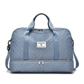 Large Oxford cloth leisure travel holdall in a street style, shown in a solid colour with sewing thread detail.