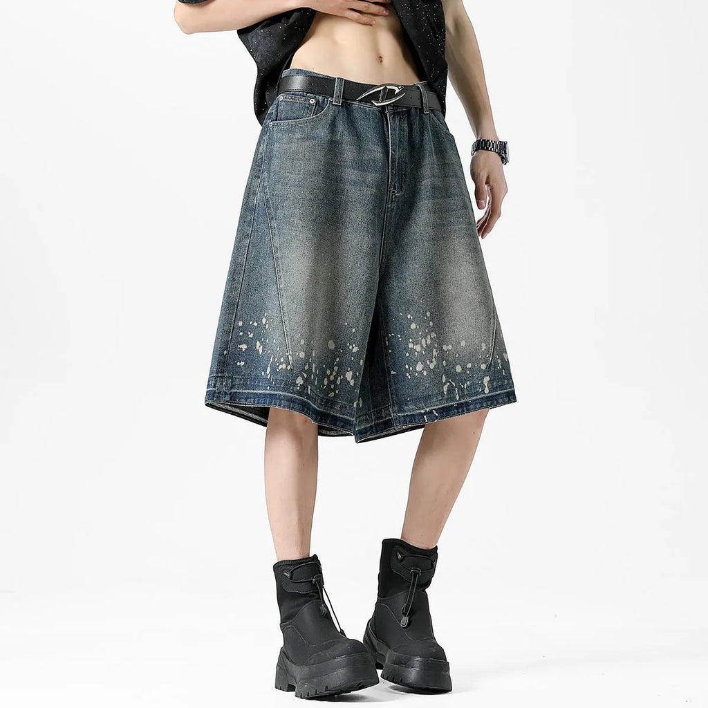 Men's retro blue denim shorts with splash ink pattern and ripped straight-leg design