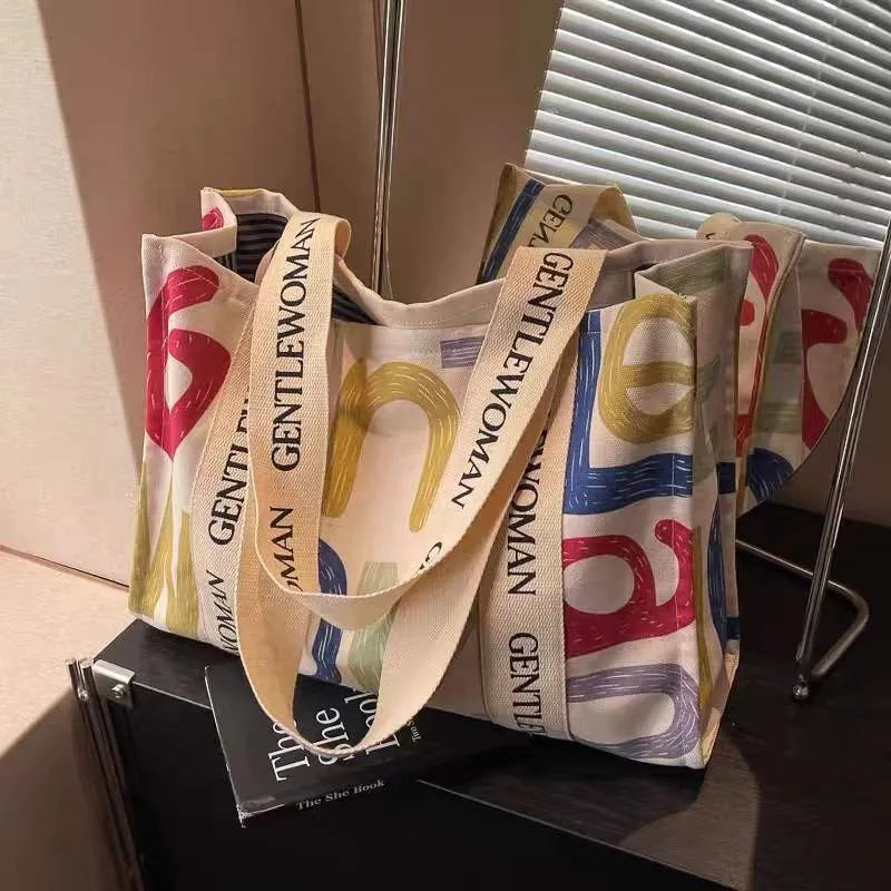 Canvas women's tote bag with printing detail in large capacity design