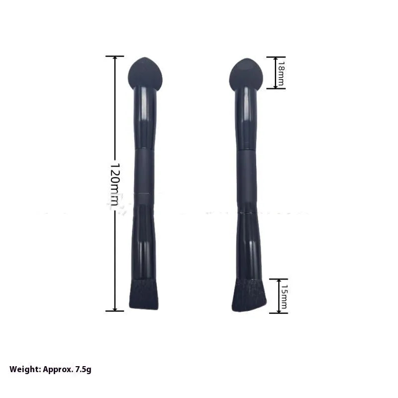 Black concealer brush with a tapered fibre head and wooden handle for makeup application.