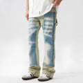Yellow and blue retro patchwork jeans with splash-ink damaged design, mid-waist cut with zip fly