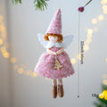 White cloth angel skirt Christmas pendant with plush texture on green tree branch