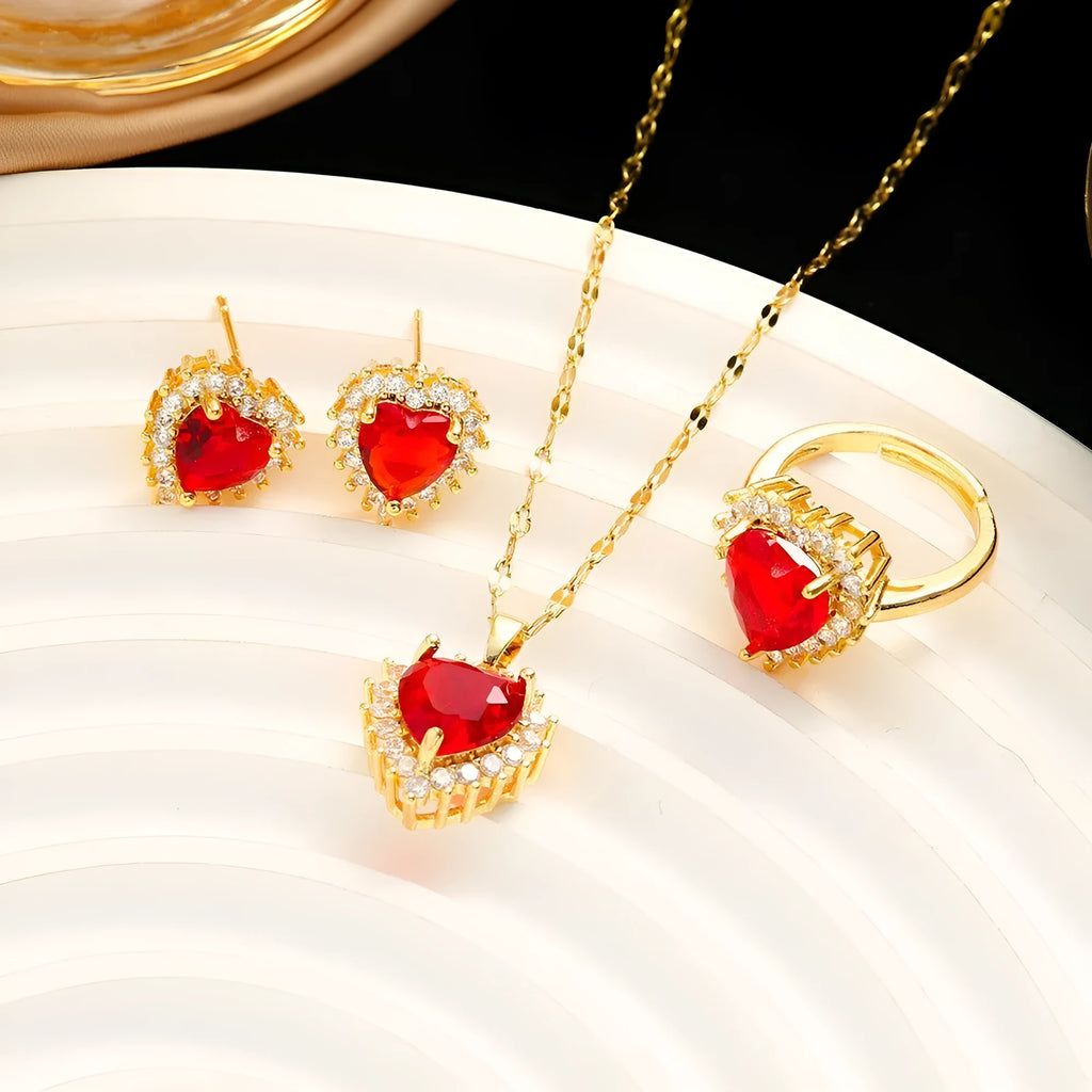 Gold red titanium steel jewellery set with heart flower pendant, matching earrings and ring