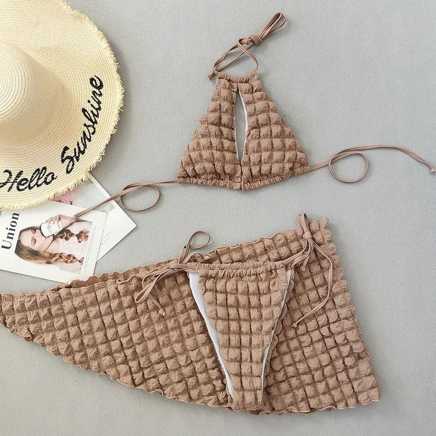 Brown seersucker three-piece bikini with lace-up top, pants, and skirt for women