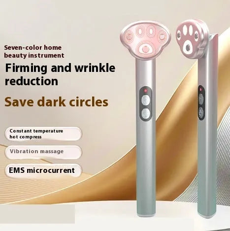 Gradient pink cat's paw shaped eye massager with micro-current vibration and colour light functions.