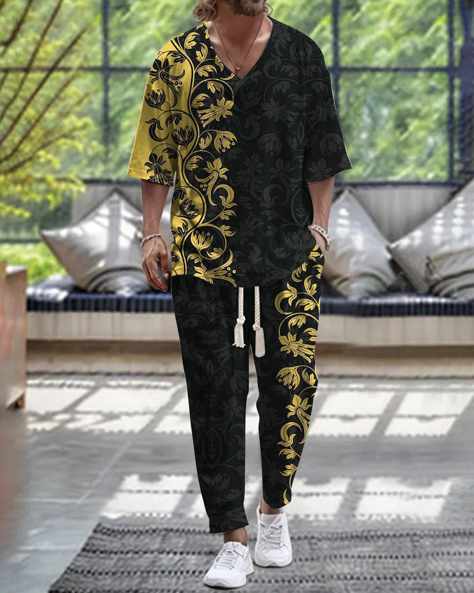 Thin polyester trousers suit with V-neck cropped sleeve jacket and matching trousers on a hanger.