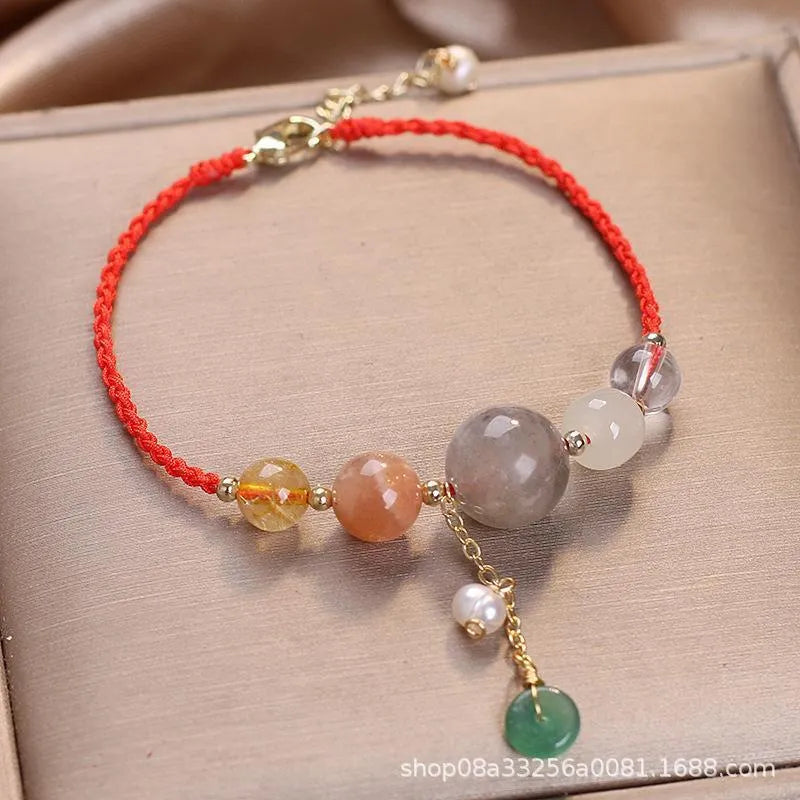 Hand-woven crystal bracelet with sequin details and adjustable buckle in three colour options