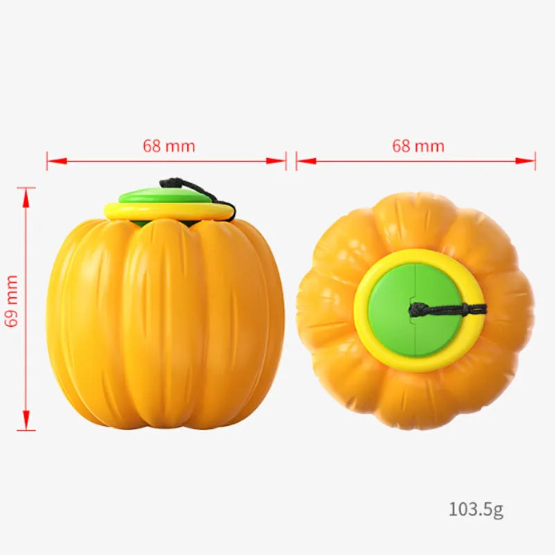 Green, orange, and yellow pumpkin-shaped squeaker dog ball toy for small dogs, shown with size scale.