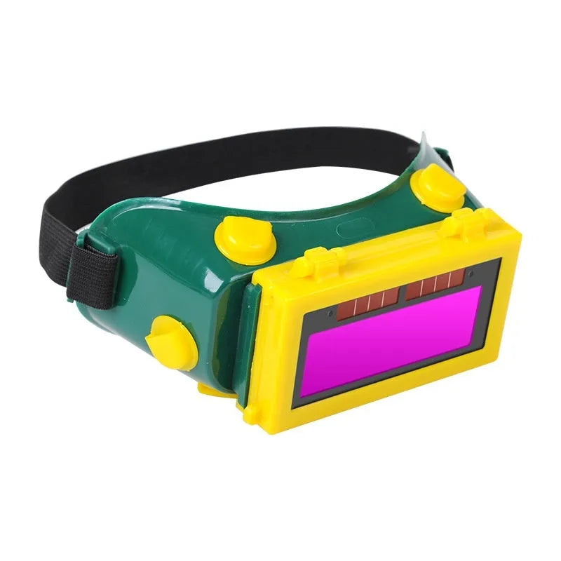 Light-changing electric welding glasses head-mounted type in green with flip dimmer and protective films