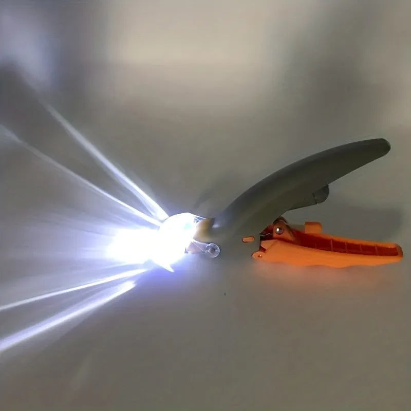 Yellow LED pet nail trimmer with magnifying glass and built-in nail catcher for cats and dogs.