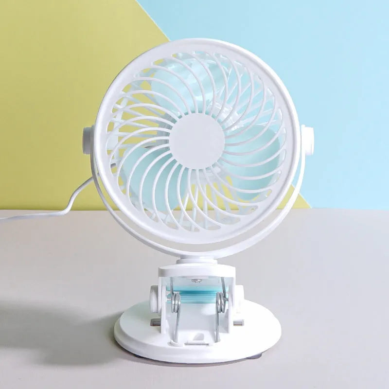 Compact USB desk fan with clip attachment and three blades for quiet personal cooling