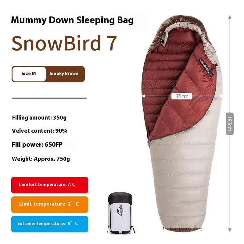 Goose down mummy style sleeping bag for adults with a storage bag.