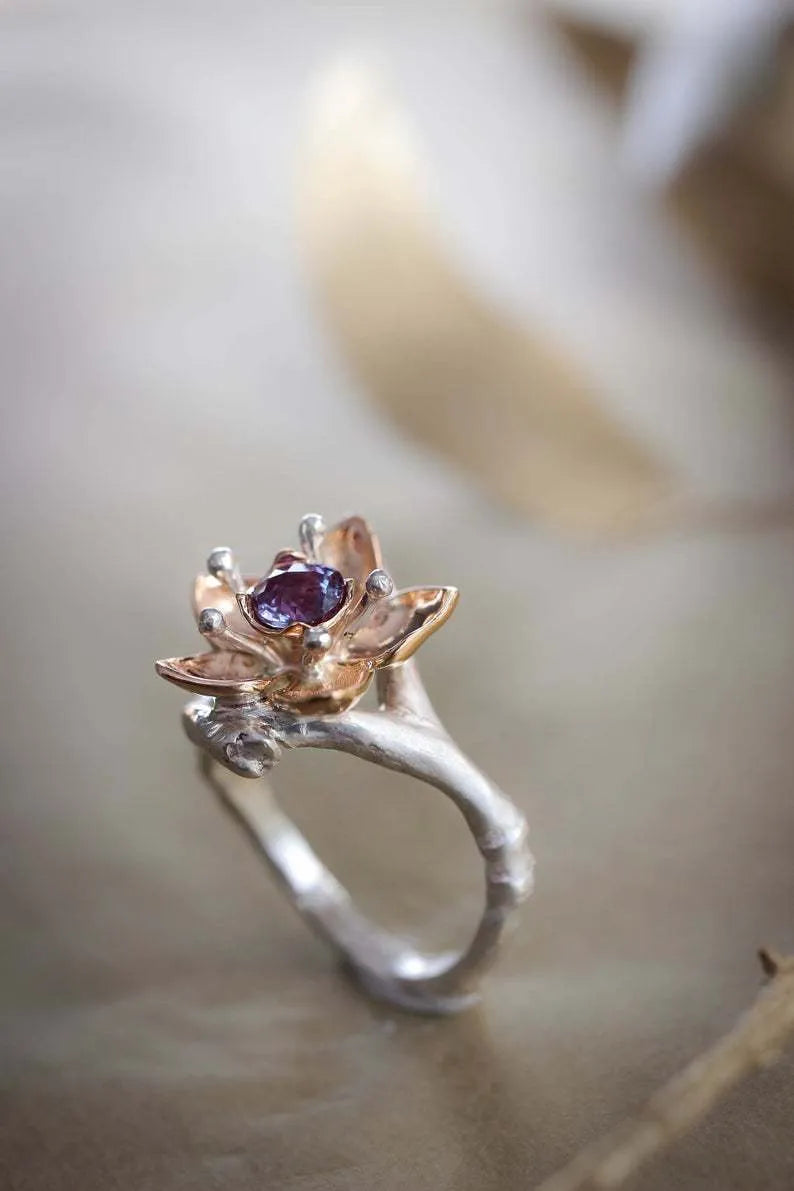Silver two-tone alloy women's ring with geometric floral pattern, shown in UK size no.7