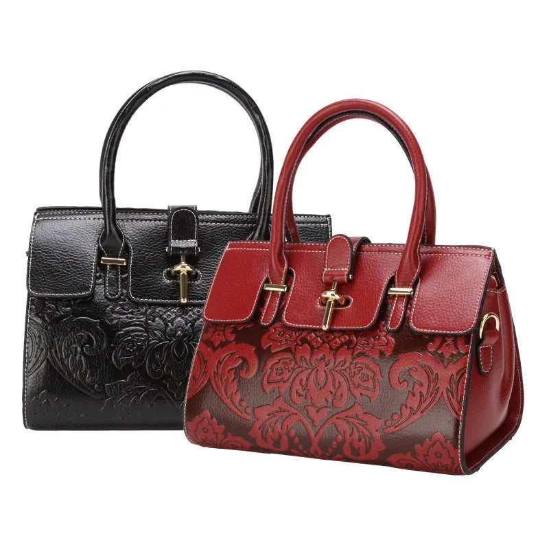 Genuine leather vintage embossed women's crossbody bag in black showing laptop compartment interior