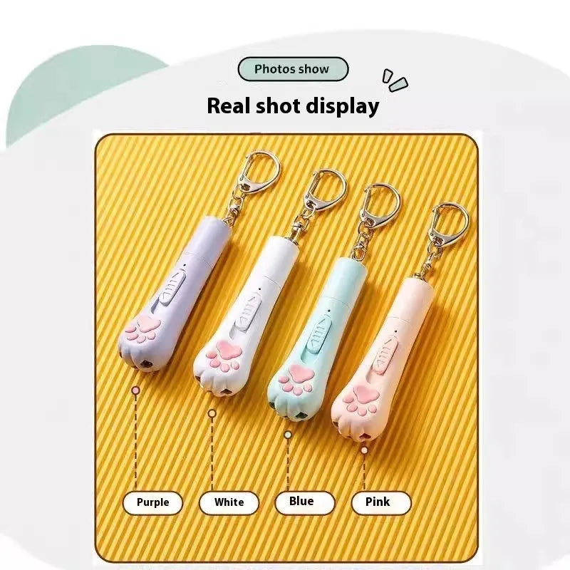 Rechargeable cat pen light toy with teaser attachment in pink, cream white, or sky blue